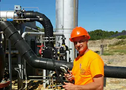 Randy Handlovsky using his Sage Prism to measure landfill gas before combustion.