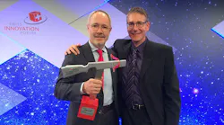 Endress+Hauser developers Dr. Wolfgang Drahm (left) and Dr. Martin Anklin (right) with the Swiss technology award. Image courtesy of Endress+Hauser