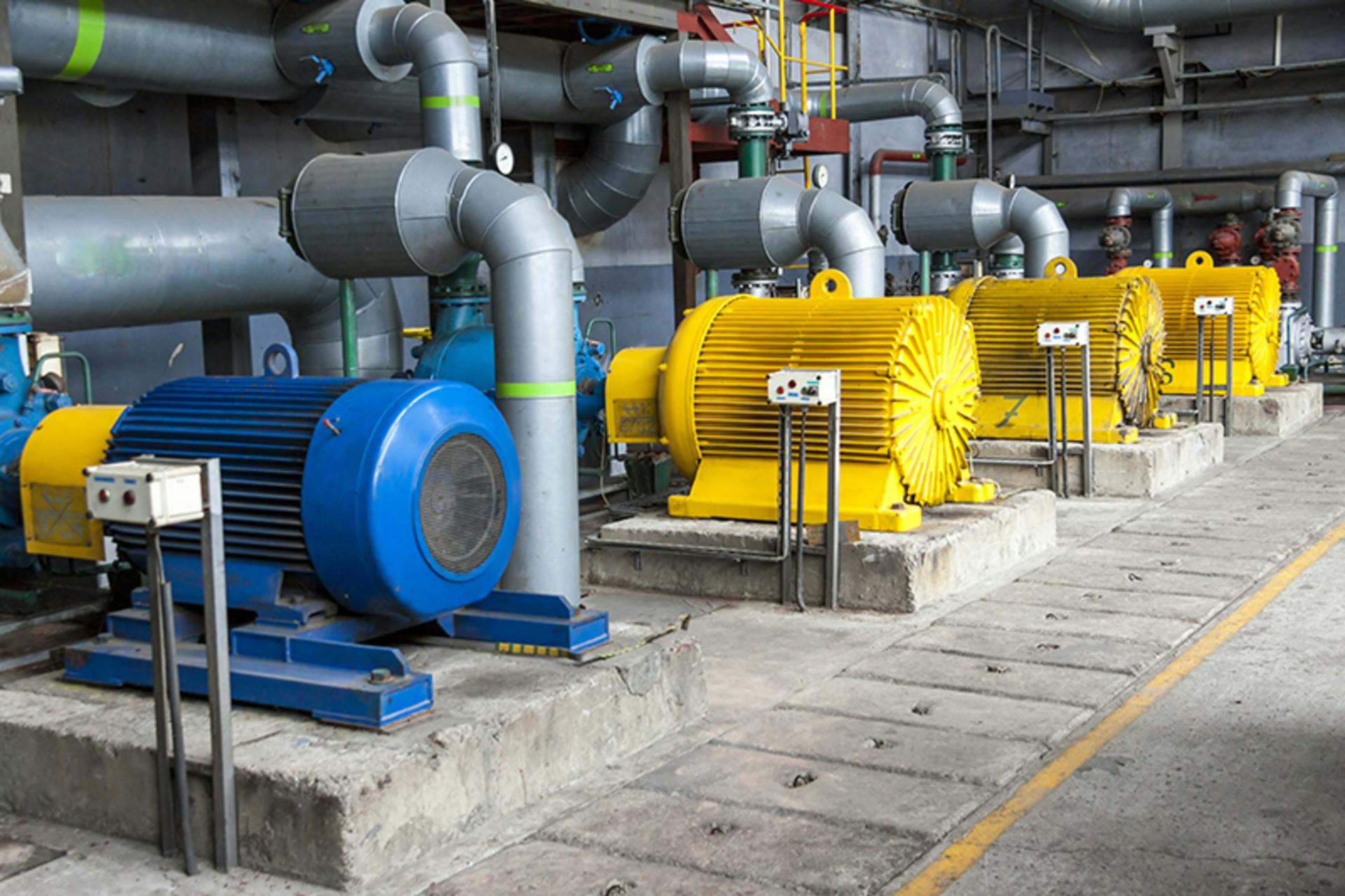 Large water pumps with electric motors. Parys/iStock.