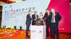 CMR managers and assorted dignitaries gather at the opening of the company’s new factory in Suzhou, China