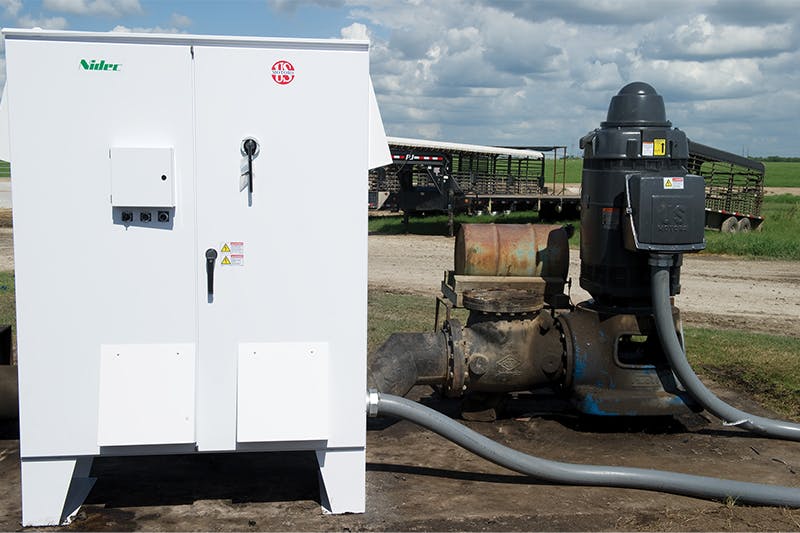 U.S. Motors Vertical Hollowshaft motor and VFD provides flexible water flow options for a cattle ranch in Texas. Courtesy of Nidec