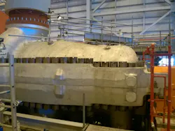 Figure 1. An example of a large high-pressure, high-flow machinery during installation. Such machinery needs sophisticated control and condition monitoring systems with many sensors.