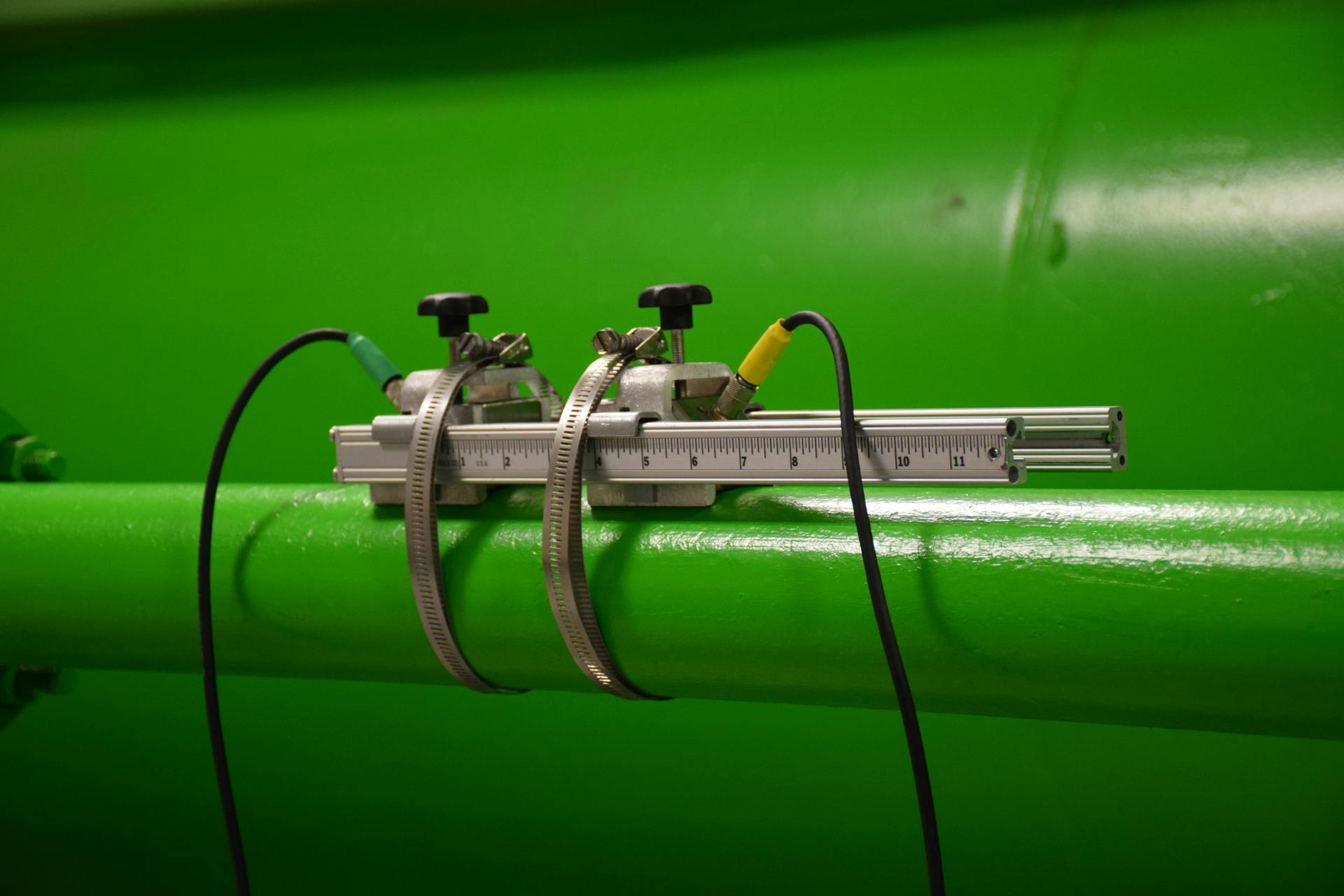 Figure 1: Clamp-on ultrasonic transducers mounted to water line.