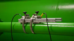 Figure 1: Clamp-on ultrasonic transducers mounted to water line.