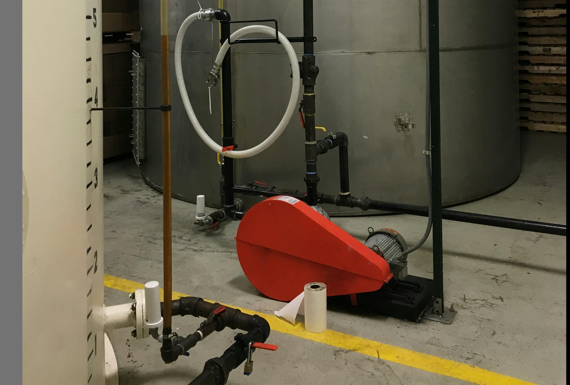 Two 20-foot tanks located inside the tortilla products processing facility hold supplies of virgin and wasted cooking oil.