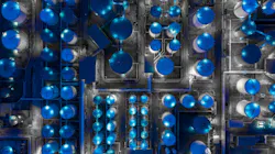 Figure 1. Aerial view of a tank farm at night. Figure 1. Aerial view of a tank farm at night.