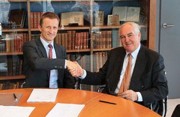 Cmc Hempel And Schaepman Shaking Hands After The Acquisition Was Made Official 360x235