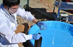 Civil engineering graduate student Zengquan Shu simulates the solar UV/chlorine treatment process. Civil engineering graduate student Zengquan Shu simulates the solar UV/chlorine treatment process.
