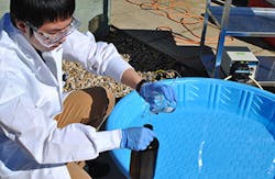 Civil engineering graduate student Zengquan Shu simulates the solar UV/chlorine treatment process.