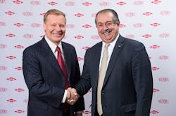 Edward D. Breen, chairman and chief executive officer of DuPont, shakes hands with Dow Chairman and CEO Andrew N. Liveris. Courtesy of DuPont. Edward D. Breen, chairman and chief executive officer of DuPont, shakes hands with Dow Chairman and CEO Andrew N. Liveris. Courtesy of DuPont.