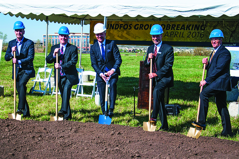 Keith Copaken, principal of Developer Copaken Brooks; Lenexa, Kansas, Mayor Hon. Michael Boehm; Poul Due Jensen, Grundfos group executive VP of sales & marketing; Terry Teach, Grundfos USA executive VP of sales for domestic buildings; Kirk Vigil, Grundfos USA director of national accounts for domestic buildings. Courtesy of Grundfos.