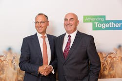 Werner Baumann (left), CEO of Bayer AG, and Hugh Grant, Chairman and Chief Executive Officer of Monsanto. Image courtesy of Bayer AG