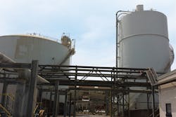 Image 1. Spar coming from the dryer is stored in one of the two silos before transfer to the hydrofluoric acid unit. This is the point where the company needed an accurate inventory measurement. All graphics courtesy of Chemours/Emerson Image 1. Spar coming from the dryer is stored in one of the two silos before transfer to the hydrofluoric acid unit. This is the point where the company needed an accurate inventory measurement. All graphics courtesy of Chemours/Emerson