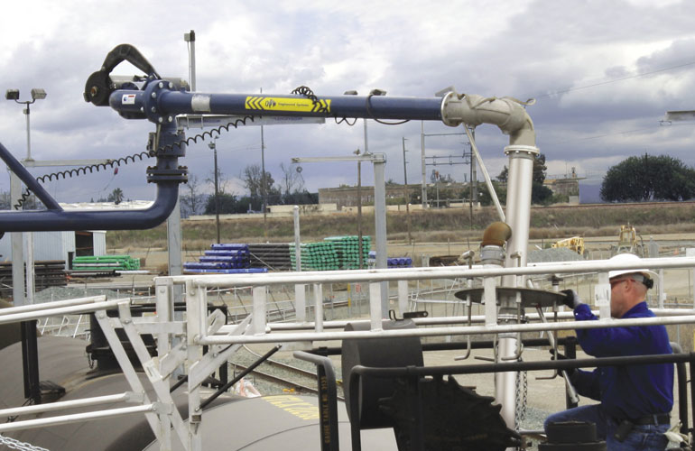 Swivel joints support this loading-arm system with a 15-foot reach, drop tubes long enough to reach the interior bottom of any railcar, and a torsionspring counterbalance. Image courtesy of OPW Engineered Systems