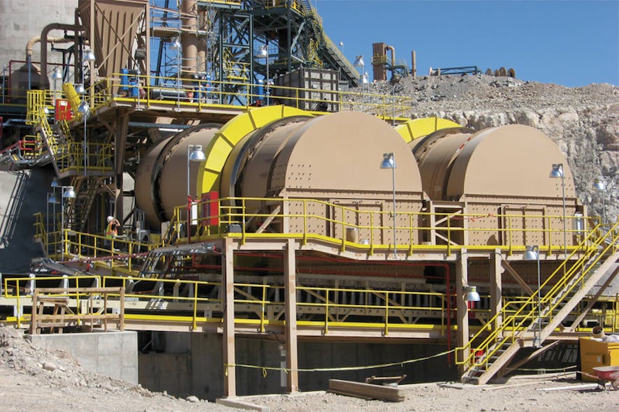 Two copper ore drums used for heap leaching. The drums are positioned at a slight incline to allow gravity to assist in moving ore fines through the drum. All graphics courtesy of FEECO International