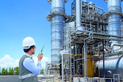 Engineer working at thermal power plant with talking on the walkie-talkie for controlling work; Shutterstock ID 561669874; Bestellnummer: – Engineer working at thermal power plant with talking on the walkie-talkie for controlling work; Shutterstock ID 561669874; Bestellnummer: –