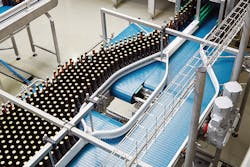NORD 93.1 helical bevel gear units with NSD TUPH powering a washdown bottling conveyor. NORD 93.1 helical bevel gear units with NSD TUPH powering a washdown bottling conveyor.