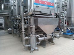 A full size HRS BP Series piston pump with screw conveyor. A full size HRS BP Series piston pump with screw conveyor.