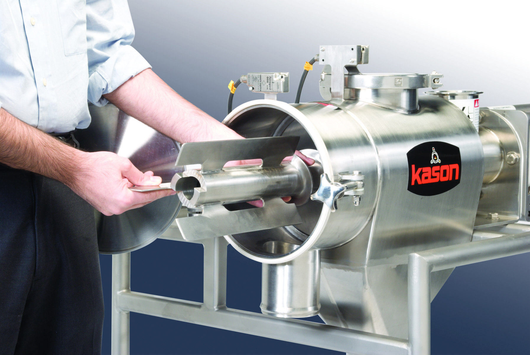 Opening a hinged door at the discharge end of the screening chamber of Kason&rsquo;s centrifugal sifter allows the retainer plate, screen cylinder and helical paddle/feed screw assembly to be removed quickly and easily.
