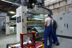 People at work on the production of flexible packaging of the Artflex company. Subsidiary of holding Russkaya Trapeza, the company was founded in 2002. People at work on the production of flexible packaging of the Artflex company. Subsidiary of holding Russkaya Trapeza, the company was founded in 2002.