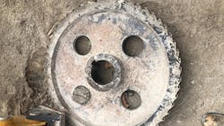 The tooth profile on this sprocket was failing frequently due to a lack of protection from the elements, poor lubrication and chain stretch. A shaft-mount reducer option was commissioned and put in its place, improving efficiency and component availability. The tooth profile on this sprocket was failing frequently due to a lack of protection from the elements, poor lubrication and chain stretch. A shaft-mount reducer option was commissioned and put in its place, improving efficiency and component availability.