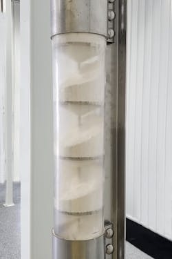 With tubular cable conveyors, solid circular discs are attached to a cable which pushes the product at low speed through the tube without the use of air, reducing the potential for dust cloud formation and preserving product integrity. With tubular cable conveyors, solid circular discs are attached to a cable which pushes the product at low speed through the tube without the use of air, reducing the potential for dust cloud formation and preserving product integrity.