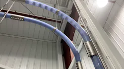 Figure 1: The Cablevey Conveyors tubular conveyor is clear except for the clamps so staff can visually check at any time. A unique cleaning inspection option involves a small, lighted camera system, with video inside the tubes viewable on a smartphone via an app.