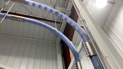 Figure 1: The Cablevey Conveyors tubular conveyor is clear except for the clamps so staff can visually check at any time. A unique cleaning inspection option involves a small, lighted camera system, with video inside the tubes viewable on a smartphone via an app. Figure 1: The Cablevey Conveyors tubular conveyor is clear except for the clamps so staff can visually check at any time. A unique cleaning inspection option involves a small, lighted camera system, with video inside the tubes viewable on a smartphone via an app.