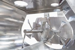 Figure 3: More and more processors specify stainless steel mixer construction today for processes that may not require or significantly benefit from its use. The interior of the stainless steel Gericke GMS Multiflux mixer in 5,000 liter capacity is shown. Figure 3: More and more processors specify stainless steel mixer construction today for processes that may not require or significantly benefit from its use. The interior of the stainless steel Gericke GMS Multiflux mixer in 5,000 liter capacity is shown.