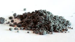 Figure 2: Material that has been processed into larger-than-desired agglomerates in a pin mixer during mixer testing in the FEECO Innovation Center. Figure 2: Material that has been processed into larger-than-desired agglomerates in a pin mixer during mixer testing in the FEECO Innovation Center.