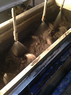 Figure 4: Pugmill (Paddle) Mixer testing in the FEECO Innovation Center. Figure 4: Pugmill (Paddle) Mixer testing in the FEECO Innovation Center.