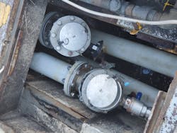 Figure 4: Initial inspection of the 316 stainless steel trough and pipe. Figure 4: Initial inspection of the 316 stainless steel trough and pipe.