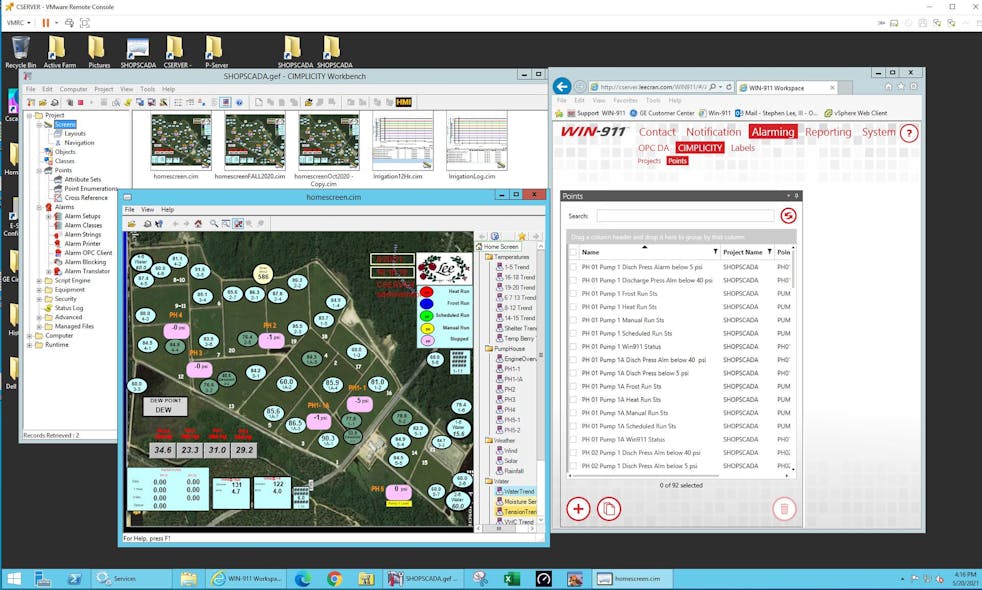 Figure 1: Workspace screen displays the GE CIMPLICITY SCADA system and WIN-911 Advanced monitoring software.
