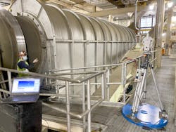 Figure 2: A FEECO customer service engineer uses a laser alignment system to realign this indirect dryer. Figure 2: A FEECO customer service engineer uses a laser alignment system to realign this indirect dryer.