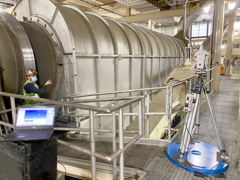 Figure 2: A FEECO customer service engineer uses a laser alignment system to realign this indirect dryer.