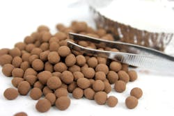 Figure 4: A sample of EAF dust granules produced during testing in the FEECO Innovation Center using a pin mixer-disc pelletizer setup. Figure 4: A sample of EAF dust granules produced during testing in the FEECO Innovation Center using a pin mixer-disc pelletizer setup.