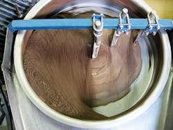 Figure 3: A disc pelletizer in operation. Figure 3: A disc pelletizer in operation.