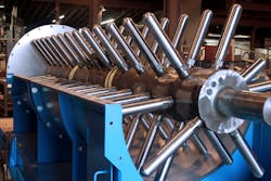 Figure 2: A FEECO pin mixer (interior view without top). Figure 2: A FEECO pin mixer (interior view without top).