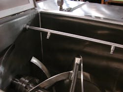 The blender features a solid double-ribbon agitator for thorough blending and an internal spray bar for adding liquids during processing. The blender features a solid double-ribbon agitator for thorough blending and an internal spray bar for adding liquids during processing.