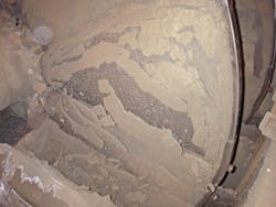 Figure 5: Plate-like clumps formed during the drying of fertilizer in a ring dryer. Figure 5: Plate-like clumps formed during the drying of fertilizer in a ring dryer.