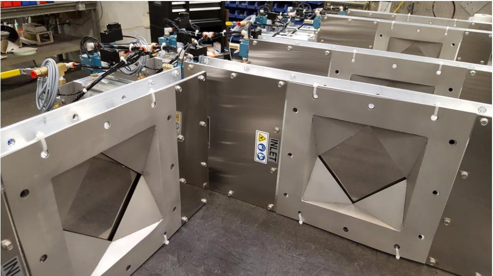 These Roller Gates feature V-notch blades and diamond-shaped inlets, so the opening maintains a square pattern that is easier to calculate when adjusting material flow.