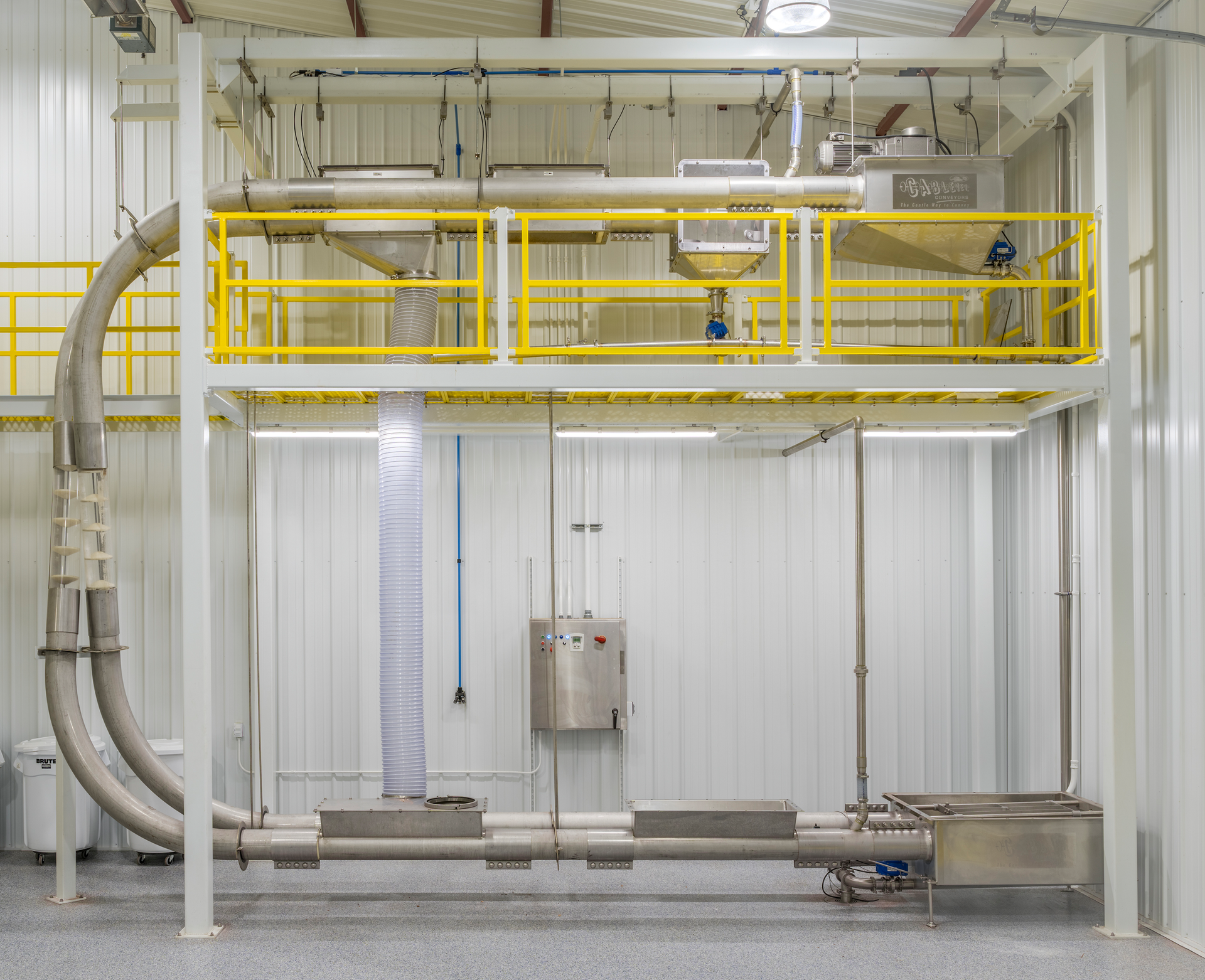 Enclosed 8-inch tubular drag cable conveyors can safely, gently convey material volumes comparable to belt conveyors or bucket elevators with less power, product loss, particle damage and downtime.