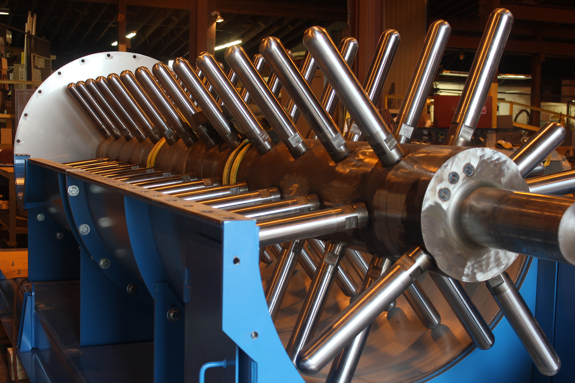A pin mixer shaft with pins in fabrication. Pin mixers have become near standard in production lines pelletizing powdered limestone and gypsum into granular soil amendment products.