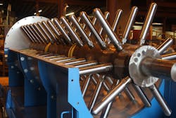 A pin mixer shaft with pins in fabrication. Pin mixers have become near standard in production lines pelletizing powdered limestone and gypsum into granular soil amendment products. A pin mixer shaft with pins in fabrication. Pin mixers have become near standard in production lines pelletizing powdered limestone and gypsum into granular soil amendment products.