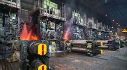 A hot strip mill within a steel factory.
