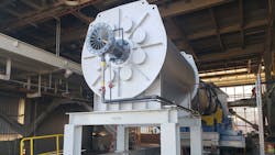 A rotary dryer with a combustion chamber on rails allows the combustion chamber to be easily moved away for maintenance and cleaning of the rotary dryer. A rotary dryer with a combustion chamber on rails allows the combustion chamber to be easily moved away for maintenance and cleaning of the rotary dryer.