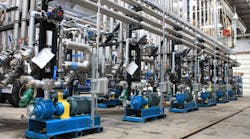 A number of Blackmer 74 GX Series Sliding Vane Pumps in operation at a chemical facility.