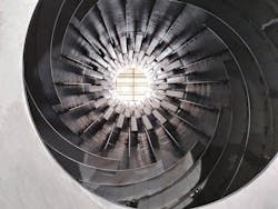 Three different flight designs, including advancing flights (spiraled), can be seen in this rotary dryer. Three different flight designs, including advancing flights (spiraled), can be seen in this rotary dryer.