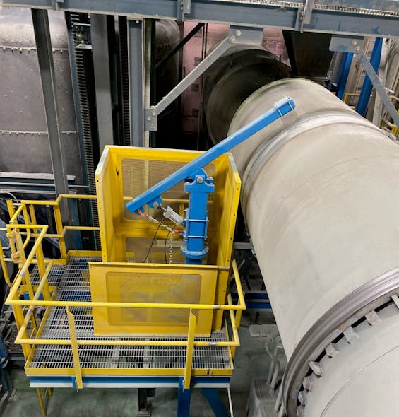 A pneumatic hammer is mounted at the side of this drum.