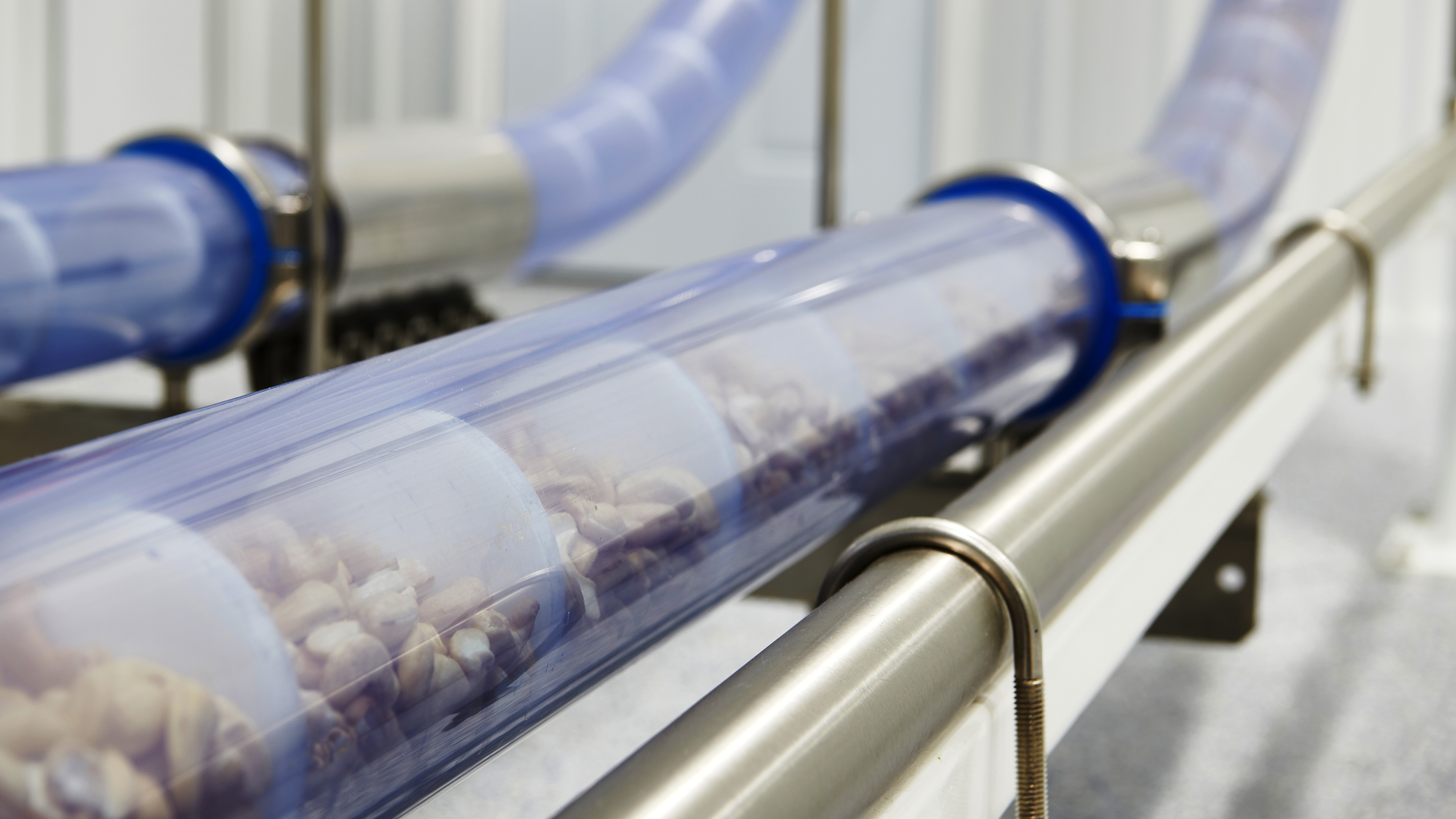 After trials and verification testing, it was found that tubular cable conveyors maintain greater repeatability cleanliness over a longer period of time than open systems due to the controlled environment within the enclosure.